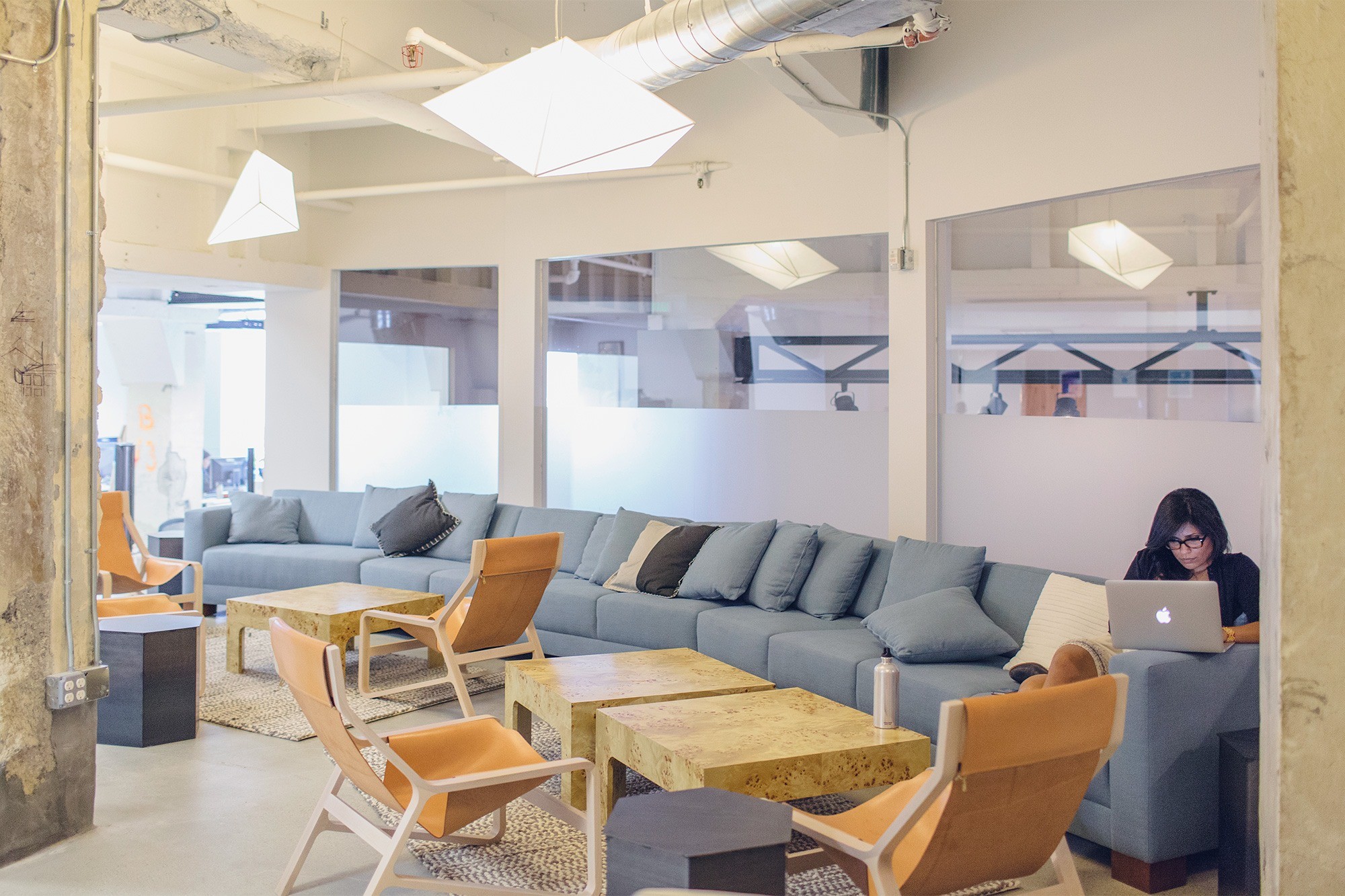 Meetings can take place in cafes around the neighborhood, conference rooms, or lounge spaces inside the office like the one shown above.